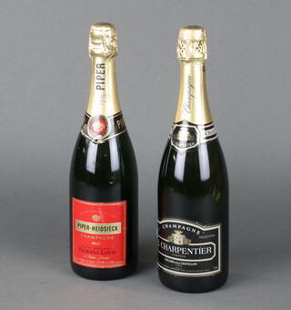 A bottle of Piper Heidsieck champagne and a bottle of J Charpentier champagne 