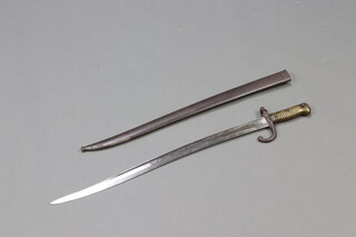 A Victorian French chassepot bayonet, the blade engraved and dated 1873 