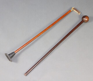 A lignum vitae knobkerrie together with a malacca cane with stag horn handle