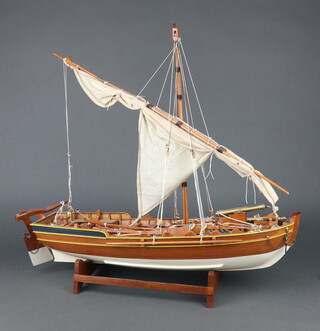 A wooden model of a Greek style ship with cannon 55cm x 59cm x 18cm 