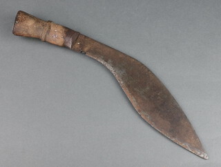 A Kukri with 27cm blade and wooden handle (cracked) 
