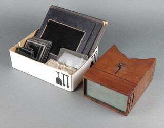 A mahogany stereoscopic slide viewer together with a collection of slides including actresses etc  