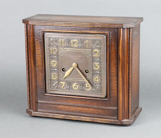 Brevington Ltd, a 1930's Art Deco striking mantel clock with square embossed copper dial with Arabic numerals 26cm x 29cm x 12cm, complete with pendulum but no key 