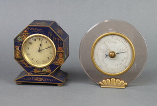 An Art Deco bedroom timepiece with gilt dial and Arabic numerals contained in an octagonal blue lacquered chinoiserie style case 10cm x 9cm x 5cm, together with a Smiths Art Deco barometer contained in a glass case 12cm x 4cm x 5cm