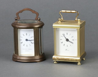 Matthew Norman, a 20th Century carriage timepiece with 3cm enamelled dial, Roman numerals, marked Matthew Norman London, contained in an oval gilt metal case 8cm x 7cm x 6cm (no key) together with  battery operated carriage clock in a gilt metal case 8cm x 5cm x 4.5cm 