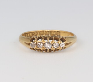 A yellow metal 18ct 5 stone diamond ring size J 1/2, 2.5 grams 