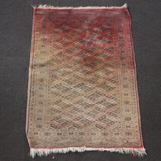 A red and blue ground Afghan rug with all over geometric design 145cm x 103cm (in wear) 