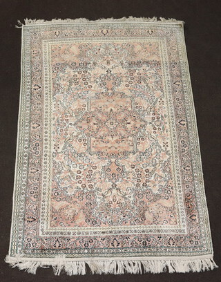 A North West Persian white ground silk rug with central medallion 181cm x 119cm 