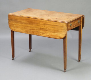 A Georgian bleached mahogany Pembroke table fitted a drawer, raised on square tapered supports, ceramic casters 66cm h x 90cm w x 46cm d