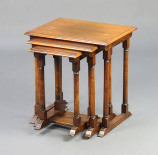 Herbert E Gibbs, a nest of 3 Art Deco rectangular oak interfitting coffee tables raised on turned supports 48cm h x 46cm w x 36cm d 