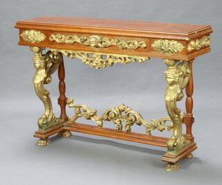 An Italian style plaster and gilt painted console table fitted a drawer with pierced frieze, raised on turned supports with mythical figures to the front ending in paw feet 92cm h x 135cm w x 36cm d 