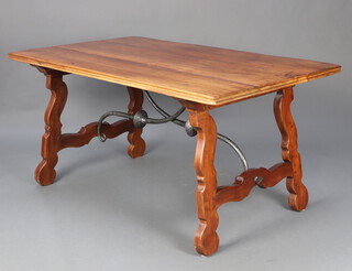 A 17th Century style Spanish fruit wood refectory table with shaped iron stretcher 76cm h x 92cm w x 153cm l 