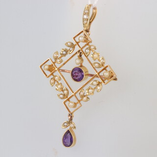 A yellow metal 15ct amethyst and seed pearl pendant brooch 4.8 grams gross, 52mm 