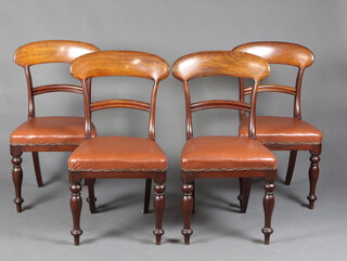 A set of 4 late Victorian mahogany bar back dining chairs with shaped mid rails and over stuffed seats, raised on turned supports 92cm h x 47cm w x 43cm d (seat 24cm x 27cm)  