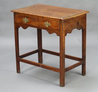 An 18th Century oak side table fitted a drawer, raised on square supports with box stretcher 54cm h x 73cm w x 47cm d 