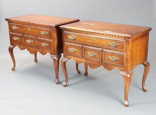 A pair of Philadelphia style cherrywood lowboys each fitted 2 drawers, raised on cabriole supports 76cm h x 91cm w x 48cm d (contact marks and slight damage to the veneers on the top in places)