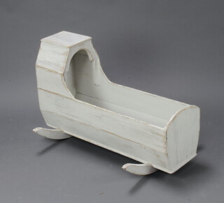 A 19th Century style white painted pine rocking crib 56cm x 92cm x 72cm 