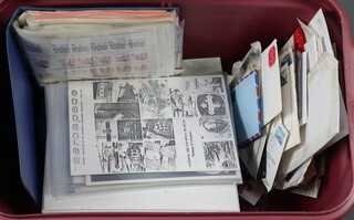 A green bound album of Elizabeth II GB stamps and 2 other albums, contained in a purple plastic crate 
