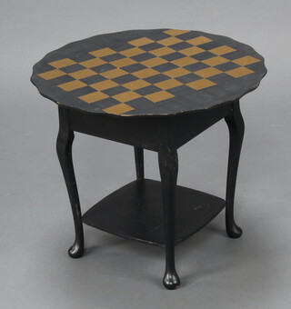 A circular black painted and gilt chess table with circular hinged lid and pie crust edge, raised on cabriole supports with undertier 42cm h x 49cm 