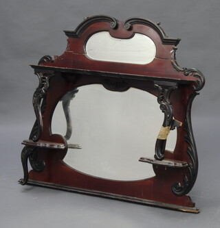 An Edwardian bevelled plate over mantel mirror contained in a mahogany frame, fitted a shelf 98cm h x 106cm w x 20cm d (split to the top, silvering to the mirror is showing signs of deterioration) 