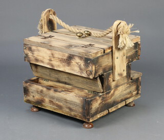 A rustic pine tool box with rope handles and hinged lid 53cm h x 46cm w x 43cm d 