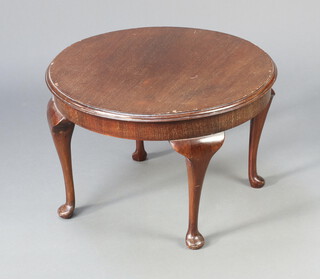 A 1930's circular mahogany coffee table raised on cabriole supports 40cm h x 60cm diam. (some scratches in places)