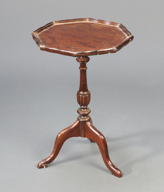An octagonal mahogany wine table on a pillar and tripod base 53cm h x 38cm 