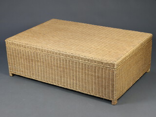 A wicker work ottoman/coffee table with hinged lid 40cm h x 120cm w x 78cm d 