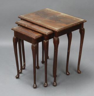 A nest of 3 walnut interfitting coffee tables raised on cabriole supports 55cm h x 50cm w x 38cm d 