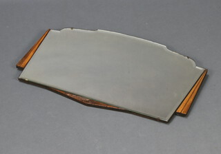 An Art Deco arch shaped bevelled plate frameless wall mirror 43cm x 69cm (Silvering to the mirror is showing signs of deterioration)