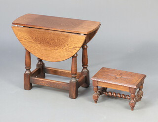 A Victorian rectangular carved oak stool, raised on turned supports with H framed stretcher 18cm h x 30cm w x 21cm d and an oak oval drop flap occasional table raised on turned and block supports with box framed stretcher 47cm h x 57cm w x 24cm d
