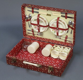 A Braxton picnic box complete with contents (1 plate a/f, glass jar missing lid), 13cm h x 49cm w x 33cm d 