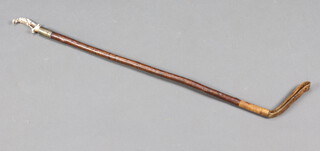 A riding crop with golfer finial 
