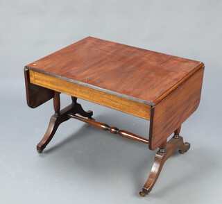 A Georgian style miniature sofa table raised on turned supports with H framed stretcher 50cm h x 67cm w x 51cm d (some contact marks)