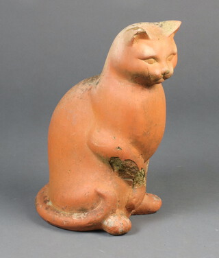 A terracotta figure of a seated cat 40cm h x 20cm w x 19cm d (chip to ear, some frost damage) 