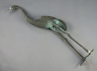 A cast metal figure of a standing stork 107cm h x 14cm x 18cm 