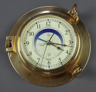 A ward room style tide clock contained in a gilt metal case 6cm x 22cm  