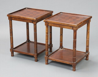 A pair of mahogany and parquetry 2 tier lamp tables, raised on turned supports 47cm h x 35cm x 36cm d (some damage to the base on one) 