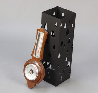 A square pierced metal umbrella stand 49cm h x 15cm w x 15cm d together with a BS aneroid barometer and thermometer contained in a walnut wheel case 40cm x 17cm 