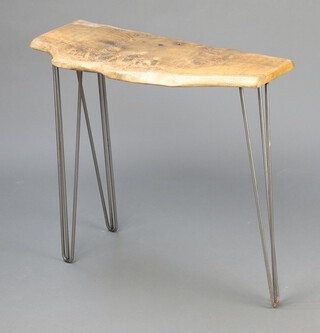 A rustic elm occasional table of shaped outline, raised on hairpin supports