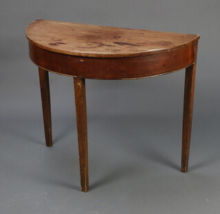A 19th Century bleached mahogany demi-lune table raised on square tapered supports 74cm h x 91cm w x 45cm d (sun bleached) 

