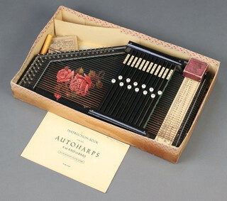 An Autoharp, boxed and with instructions 