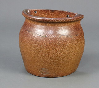 A terracotta wall pocket 26cm h x 24cm w x 13cm d 