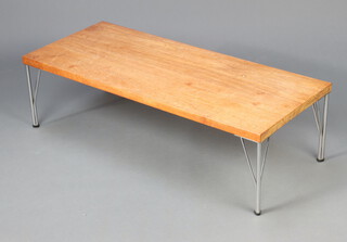 A Danish mid-Century rectangular teak coffee table raised on chrome hairpin style supports 29cm h x 104cm w x 44cm d (sun bleached and water marked to the top)  