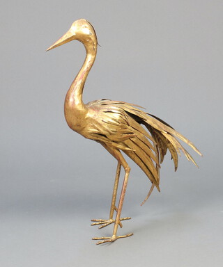 A gilt metal figure of a standing exotic bird 59cm h x 43cm w x 12cm d  