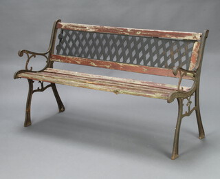 A Victorian style metal and plastic slatted hardwood garden bench  75cm h x 126cm x 51cm d (there are cracks to the plastic back and 1 section of timber is missing to left hand edge)