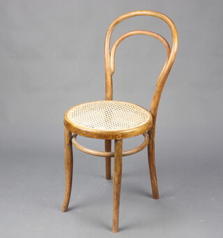 A bentwood chair with woven cane seat 88cm h 