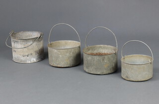 Four cylindrical galvanised paint kettles  