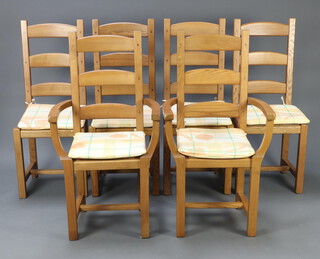 A set of 6 light oak ladder back dining chairs with woven rush seats - 2 carvers 108cm h x 57cm w x 45cm d, 4 standard chairs 108cm h x 45cm w x 38cm d  