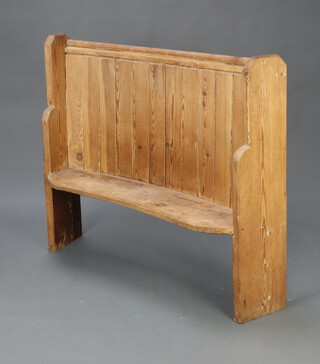 A 19th Century crescent shaped pine settle 112cm h x 125cm w x 33cm d 